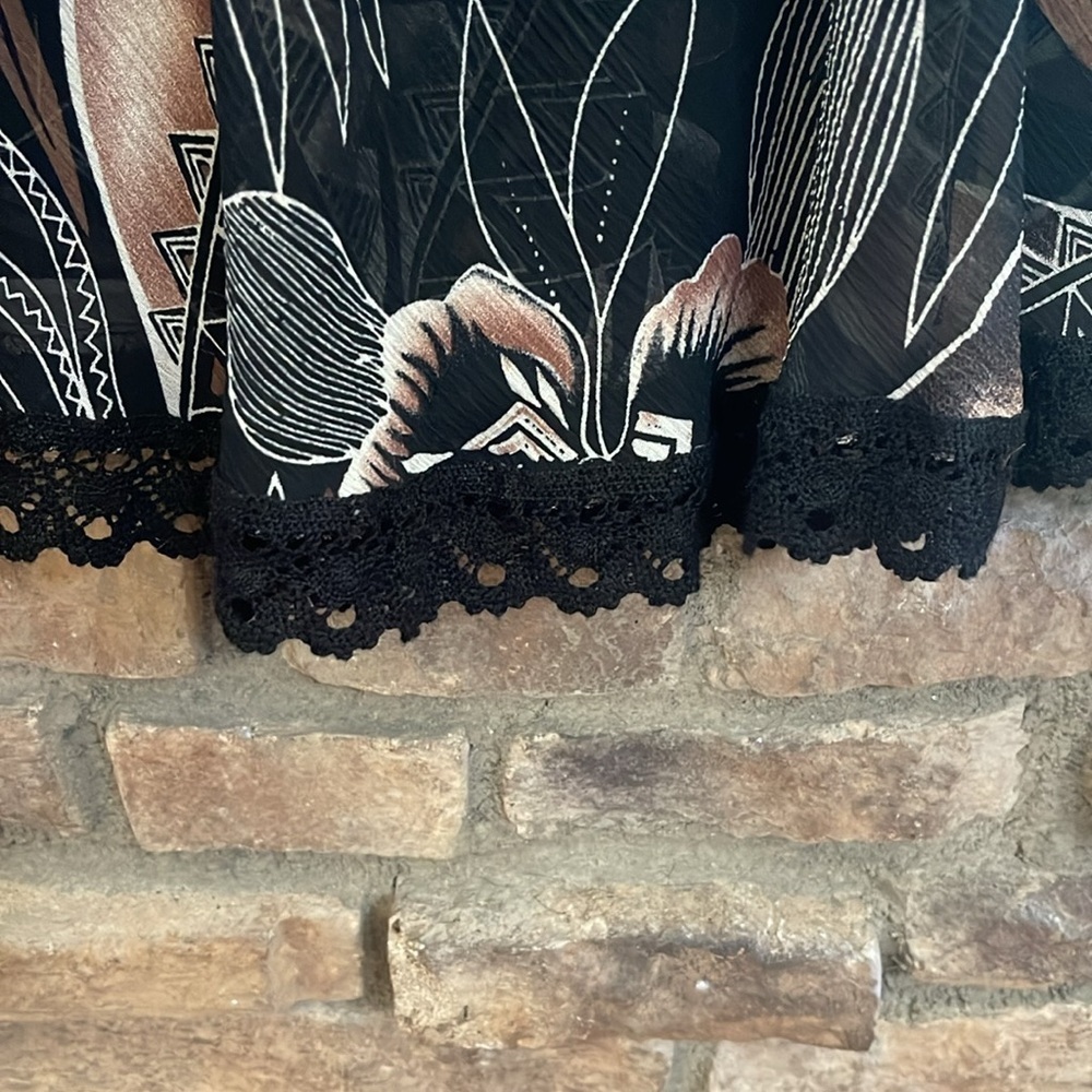Black and tan double V neck dress with leaf pattern and rows of ruffles. 16W - Picture 6 of 11